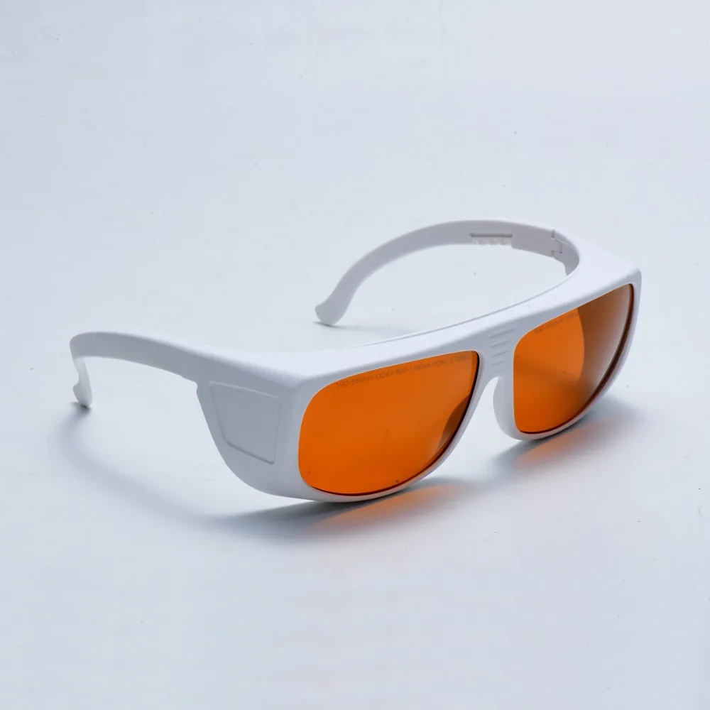 OVIO Nd:YAG Q-Switched 532/1064 nm — orange lens, three-quarter view